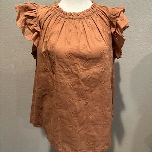 Universal Threads top